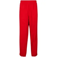 supreme x lacoste pantalon de jogging - rouge