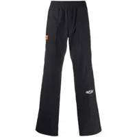 heron preston pantalon de jogging à imprimé стиль - noir