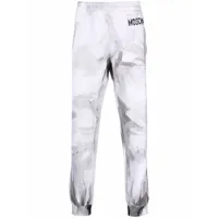 moschino pantalon de jogging à logo imprimé - blanc