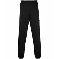 moschino pantalon de jogging à taille élastiquée - noir