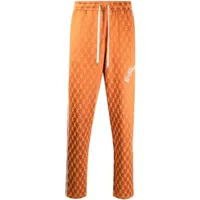 john richmond x playboy pantalon de jogging à logo imprimé - orange