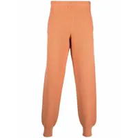 homme plissé issey miyake pantalon plissé à chevilles élastiquées - orange