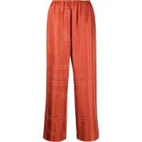 toteme pantalon à logo brodé - orange
