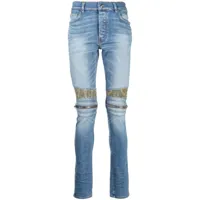 amiri jean skinny à détail de patch - bleu