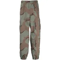 undercover pantalon de jogging à imprimé camouflage - multicolore