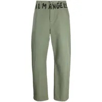 palm angels pantalon chino à logo imprimé - vert