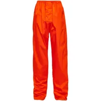 prada pantalon de jogging en nylon recyclé - orange