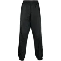 moschino pantalon de jogging à motif monogrammé en jacquard - noir
