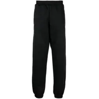 moschino pantalon de jogging à motif monogrammé - noir