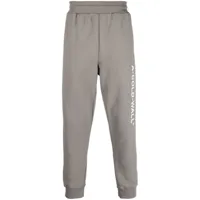 a-cold-wall* pantalon de jogging essential à logo imprimé - gris