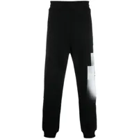 a-cold-wall* pantalon de jogging à logo brutalist imprimé - noir