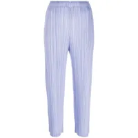 pleats please issey miyake pantalon fuselé à design plissé - violet