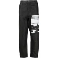 oamc pantalon en coton biologique à imprimé graphique - noir