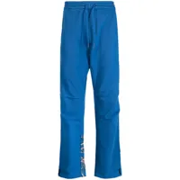 maharishi pantalon en coton à imprimé graphique - bleu