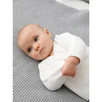 cardigan brassière bébé en laine et coton blanc