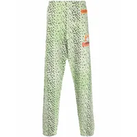 heron preston pantalon de jogging à motif abstrait - vert