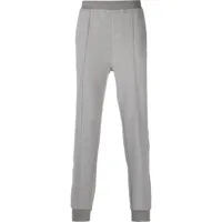 corneliani pantalon de jogging fuselé à patch logo - gris