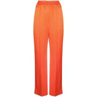 nanushka pantalon ample en satin - orange