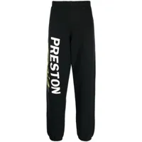 heron preston pantalon de jogging en coton biologique à logo imprimé - noir