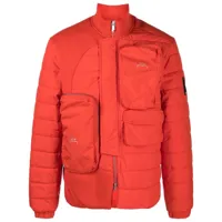 a-cold-wall* veste matelassée à poches zippées - orange