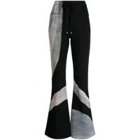 madison.maison x designing hollywood pantalon de jogging à motif hand - noir