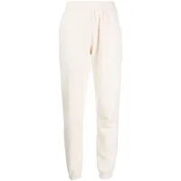 the upside pantalon de jogging à logo brodé - blanc