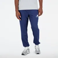 new balance homme pantalons essentials stacked logo french terry sweatpant en bleu, cotton fleece, taille xs
